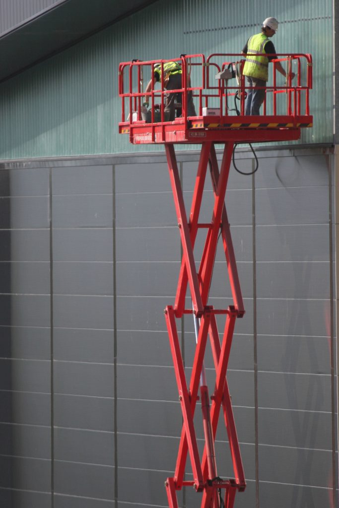 Do you have to wear a harness in a scissor lift?